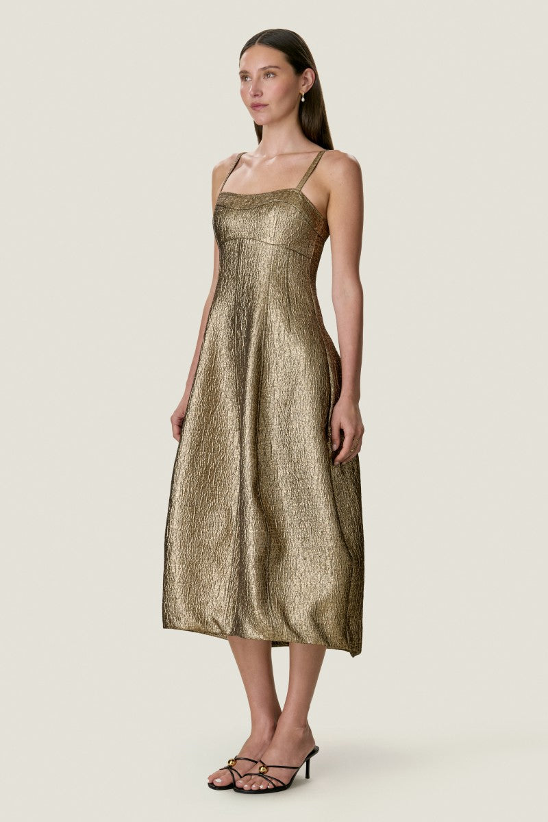 Rebecca Taylor Amelia Tulip Midi Dress in gold, featuring a flowy silhouette and elegant design, perfect for stylish occasions.