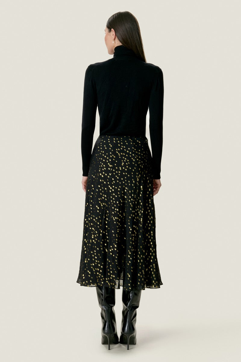 Rebecca Taylor NOHA metallic dot midi skirt with a shiny finish and pattern, showcased in a stylish, flowing design.