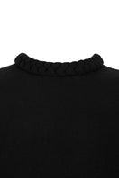 Black ruched braided T-shirt by MAZ Manuela Álvarez, featuring textured fabric and casual fit, designed for stylish everyday wear.