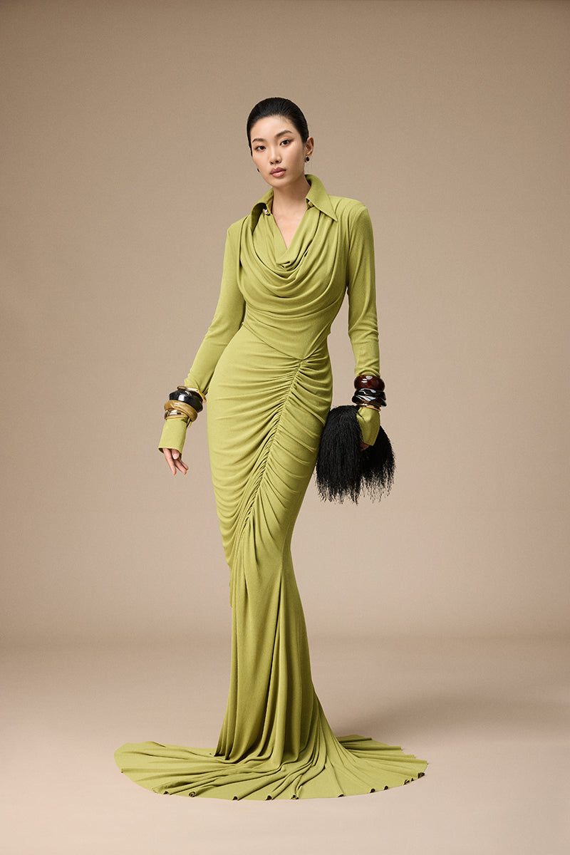 Jenny K Tran Rustique dress in peridot, elegant gown with flowing fabric and detailed design, suitable for formal occasions.