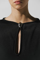 Black Ramila maxi dress by Baobab featuring a flowing silhouette and elegant design, shown on a model.