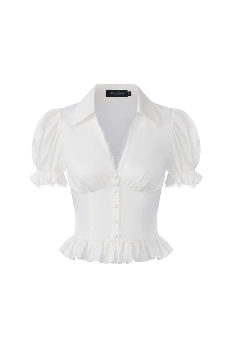 White Raven puff sleeve top by Nana Jacqueline, front view showing stylish design and feminine silhouette.