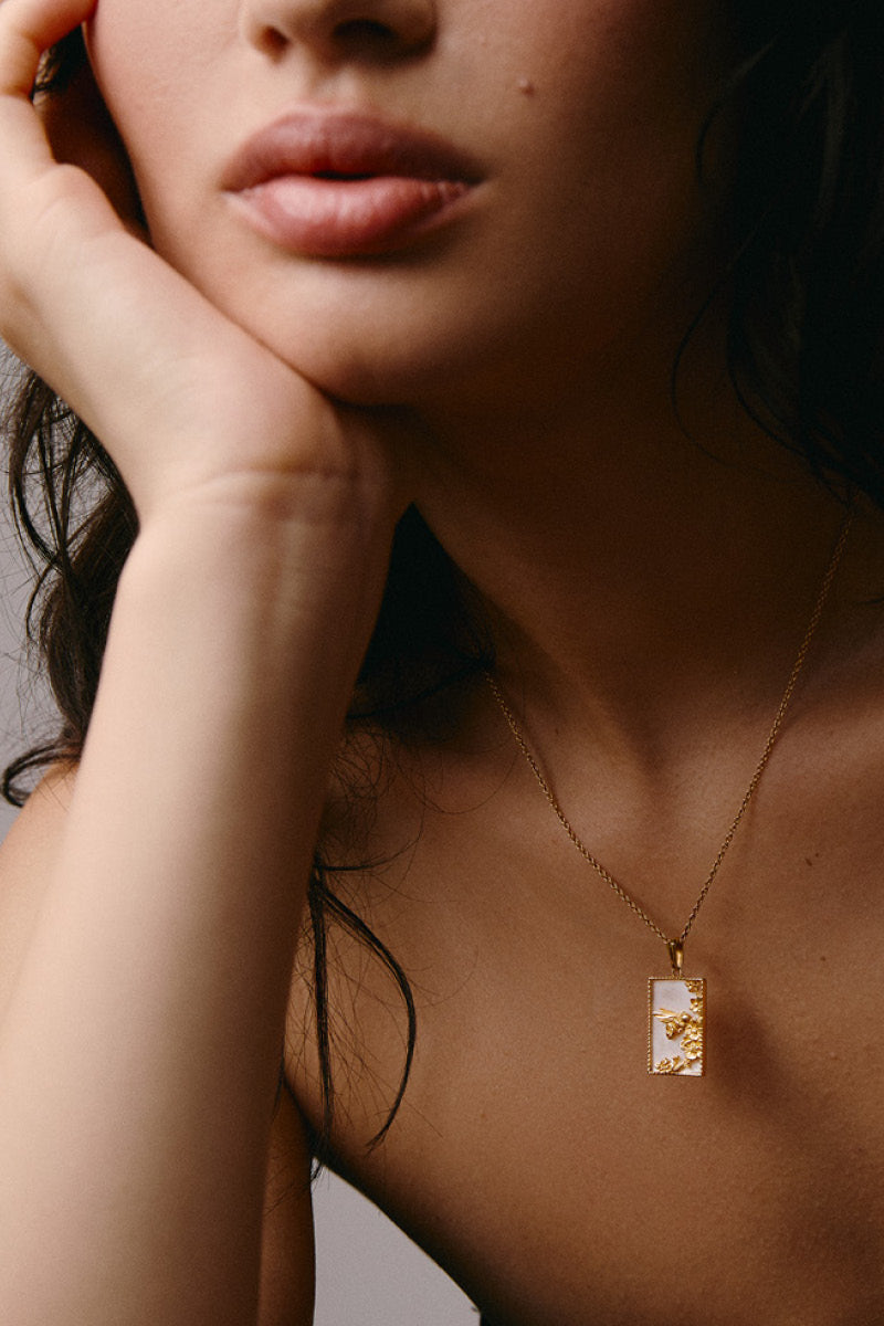 Gold vermeil rectangle bee necklace by Freya Rose, featuring a sleek geometric pendant on a delicate chain.