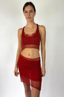 Red chain racerback top with bralette detail by Natalia Fedner, featuring a fitted design and vibrant red color.