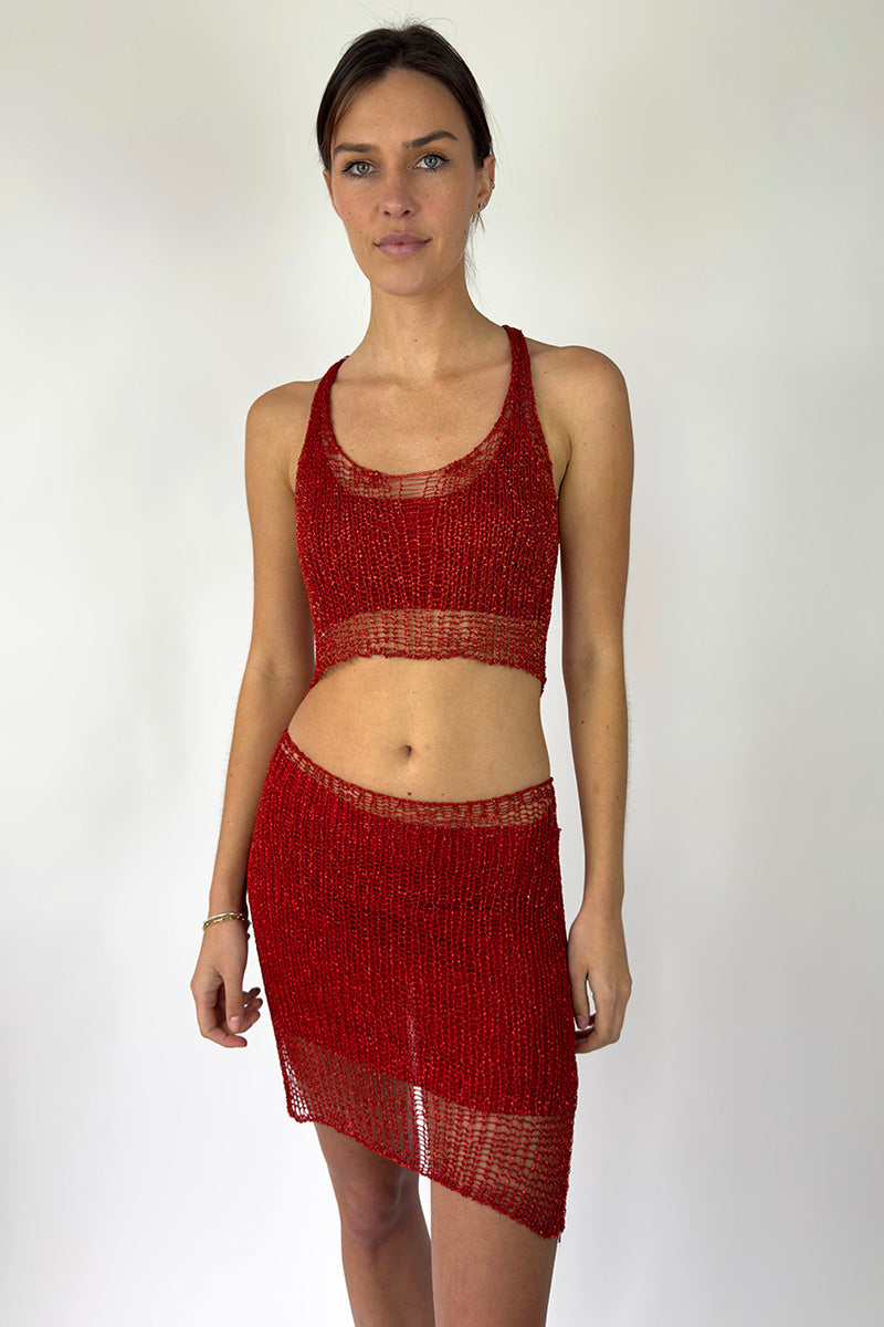 Red chain racerback top with bralette detail by Natalia Fedner, featuring a fitted design and vibrant red color.