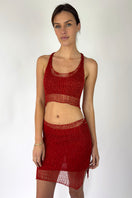 Red chain racerback top with bralette design by Natalia Fedner, shown from side view highlighting the vibrant red color and unique chain details.