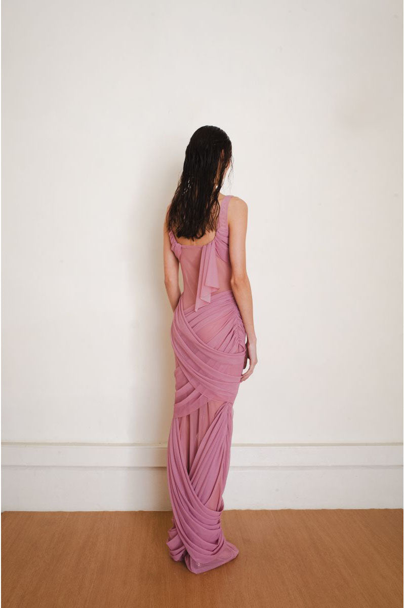 Pink reflection gown maxi dress by YASSMIN SALEH, back view showing flowy fabric and elegant design.