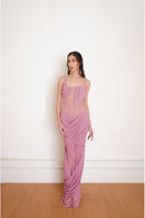 Pink Reflection gown by Yassmin Saleh, elegant maxi dress with flowing fabric, front view showcasing its stylish design.