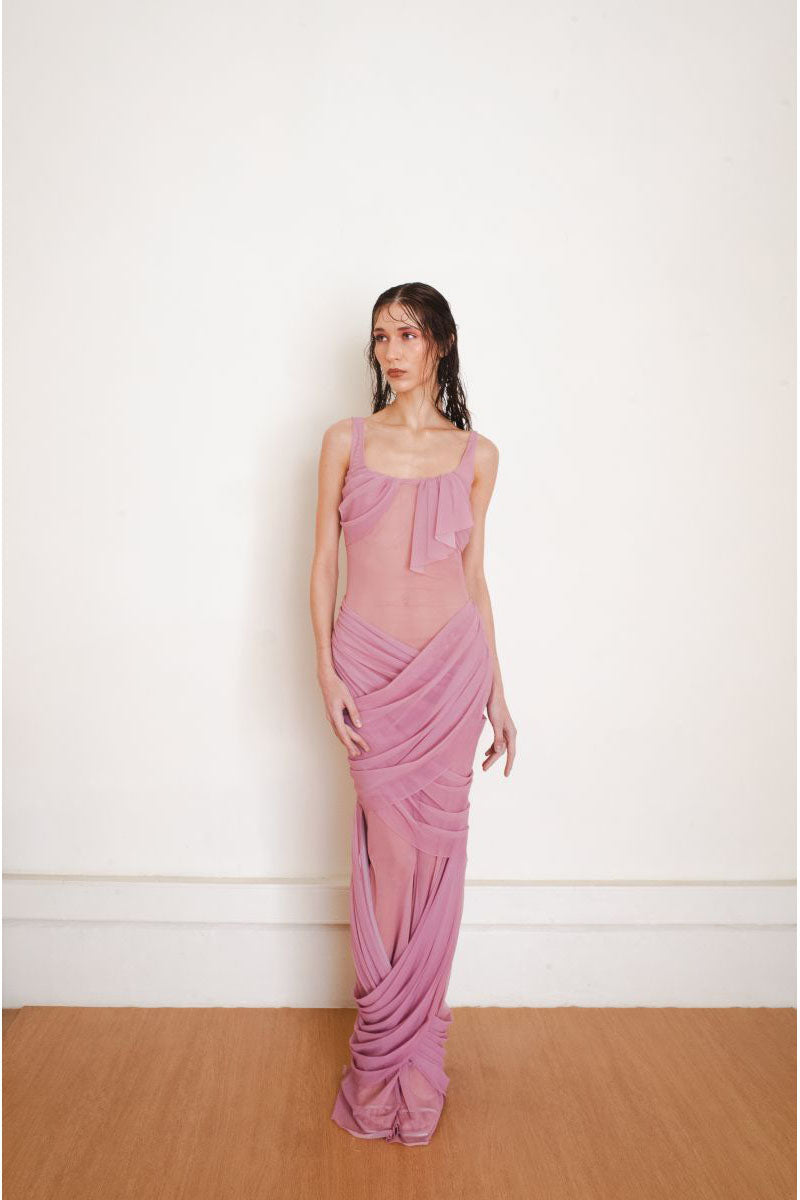 Pink Reflection gown by Yassmin Saleh, elegant maxi dress with flowing fabric, front view showcasing its stylish design.