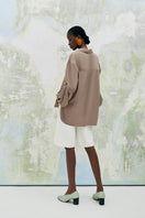Beige chamomile straight-collared poplin high-low shirt by Lecia, featuring a classic collar and stylish design.