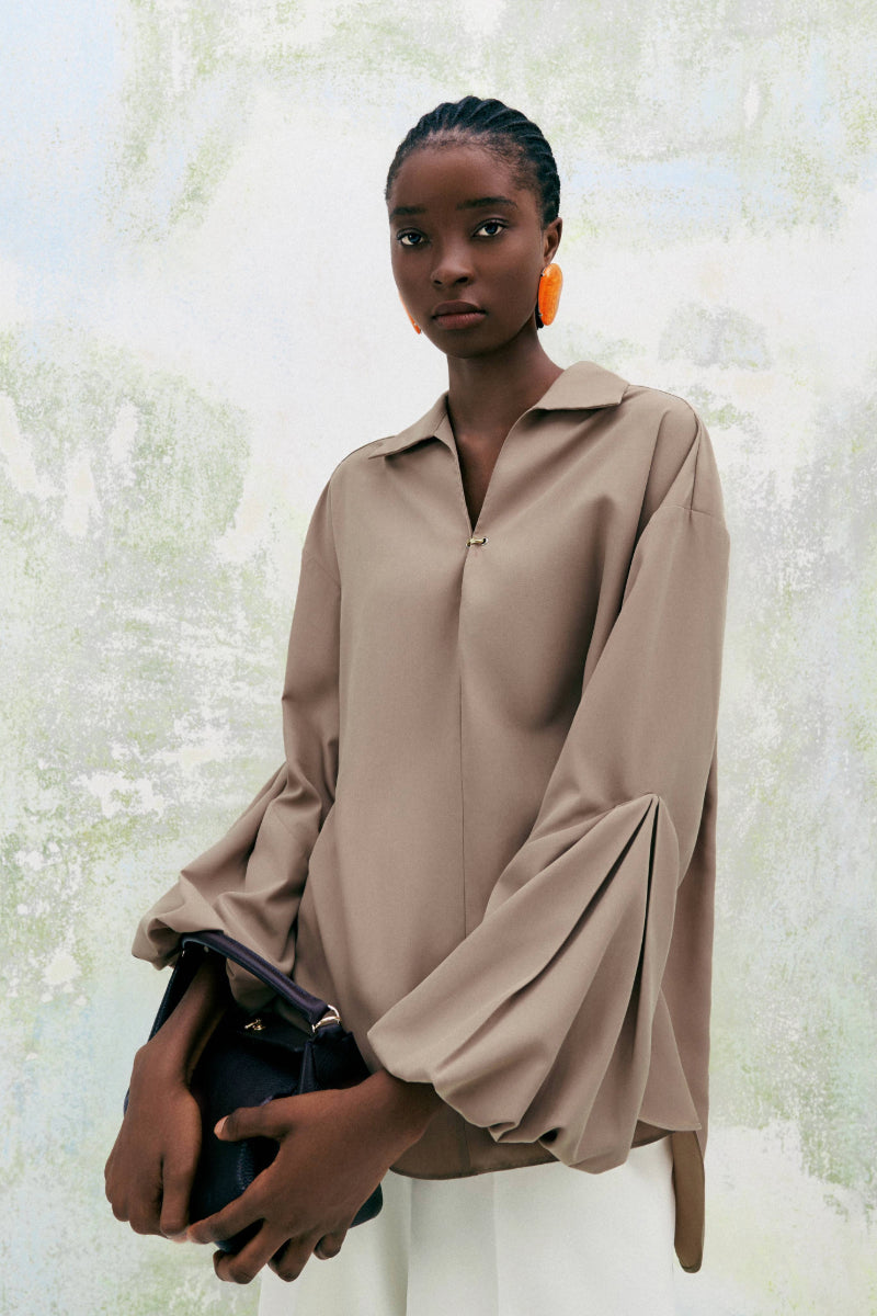 Beige chamomile straight-collared poplin high-low shirt by Lecia with long sleeves and button front detailing.