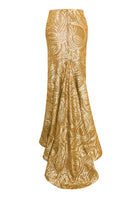Nana Gotti Empire Chic maxi skirt in flowing fabric with a stylish waist design, perfect for elegant summer outfits.