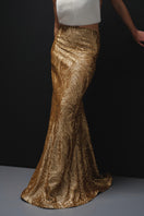 Nana Gotti Empire Chic Maxi Skirt in flowing fabric with elegant design, perfect for stylish and comfortable summer wear.
