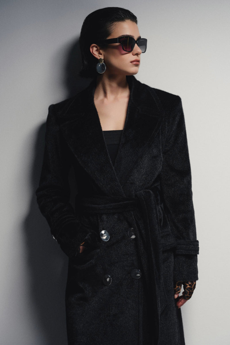Nana Gotti Astor Allure Coat displayed on a hanger with a stylish, structured design in neutral fabric.