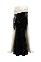 Black and white Narges sequined lace and silk taffeta gown by 21Six, featuring elegant detailing and a flowing silhouette.