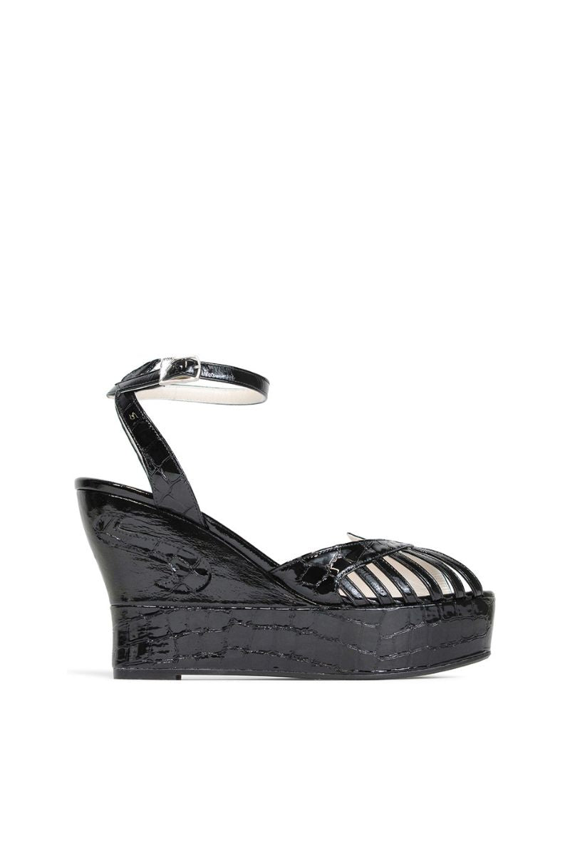 Black Margaux mid heels by Terry de Havilland featuring sleek leather straps and a stylish mid-heel design.