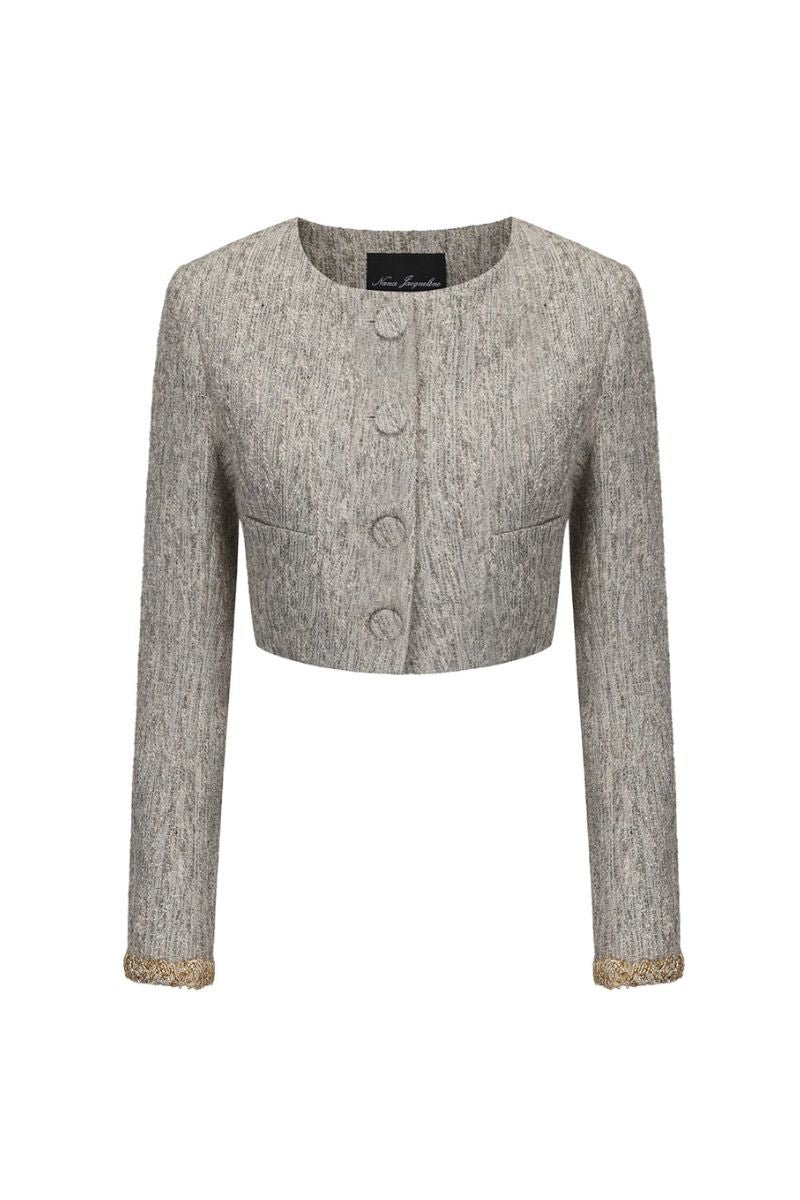 Nana Jacqueline Francesca cropped coat with tailored fit, shown in a stylish outdoor setting.