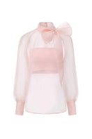 Nana Jacqueline Eve Diamond Pink Top featuring a stylish, fitted design with diamond-shaped details and short sleeves.