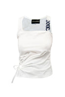 Recycled cotton top from JC Pajares featuring a relaxed fit, soft texture, and stylish design in natural tones.