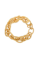 Gold chunky necklace by Silvia Gnecchi featuring bold, oversized links, styled on a neutral background.