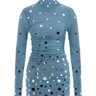 Sudi Etuz mirror-covered jersey mini dress displayed on a model, featuring a fitted silhouette and reflective mirror embellishments.