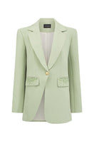 I.H.F Studio mint single-breasted blazer displayed on a hanger, showing its tailored fit and classic lapel design.
