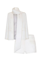 AWAVE suit set featuring a tailored jacket with a detachable shawl collar paired with matching mini shorts, stylish and modern.