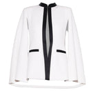 Lili Blanc black and white sleek cape blazer featuring a modern design, tailored fit, and stylish lapel details.
