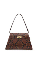 Vikela Studio Stephanie bag in animal print, top handle handbag with stylish design and textured animal pattern.