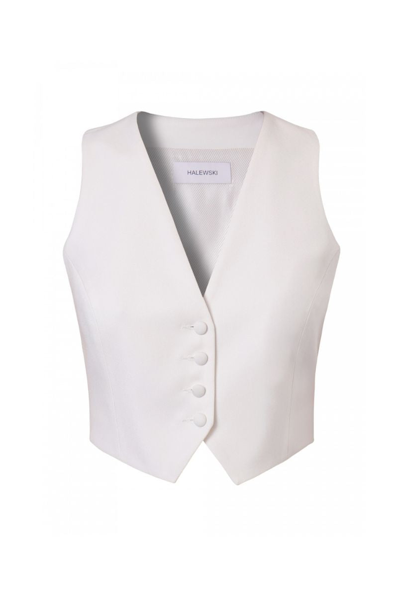 Off-white Sylvia vest by AGGI by HALEWSKI, featuring a sleek fit and minimalistic design, displayed on a plain background.