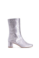 Silver Olivia boots by Terry de Havilland featuring sleek leather design and pointed toes, displayed on a neutral background.
