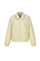 Beige cotton bomber jacket by Chictopia featuring a classic fit, ribbed collar, and zip closure, shown on a model.