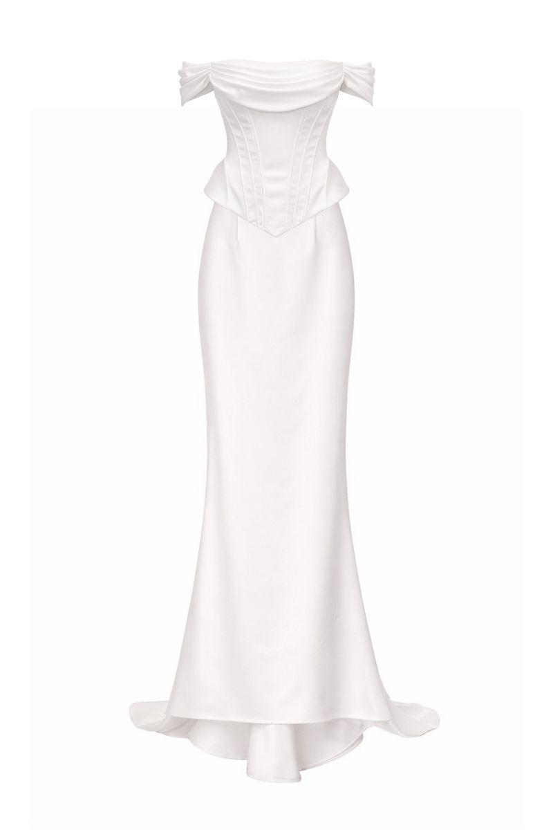 White Valentina co-ord top and skirt set by Gigii's, featuring a stylish matching crop top and high-waisted skirt.