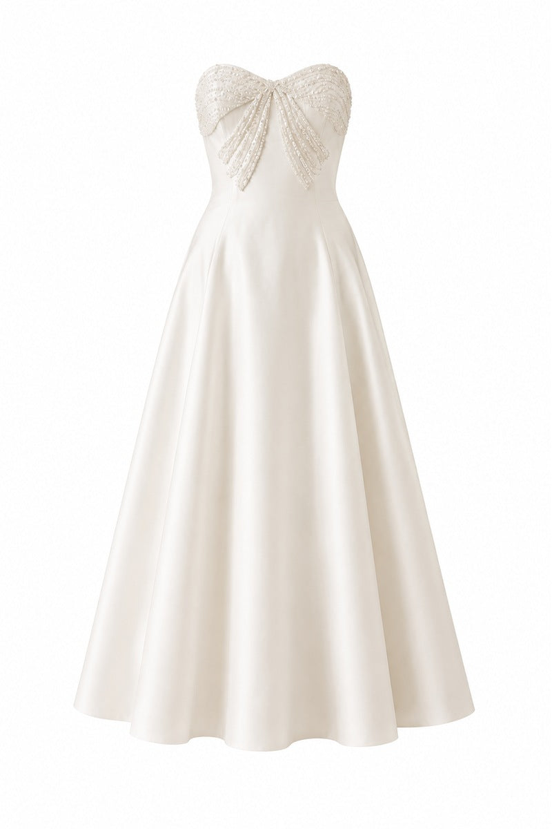 Nihan Peker vanilla ribbon dress gown featuring a flowing silhouette and elegant ribbon detailing.