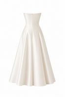 Nihan Peker vanilla ribbon dress gown with elegant satin ribbon details and flowing fabric, perfect for formal occasions.