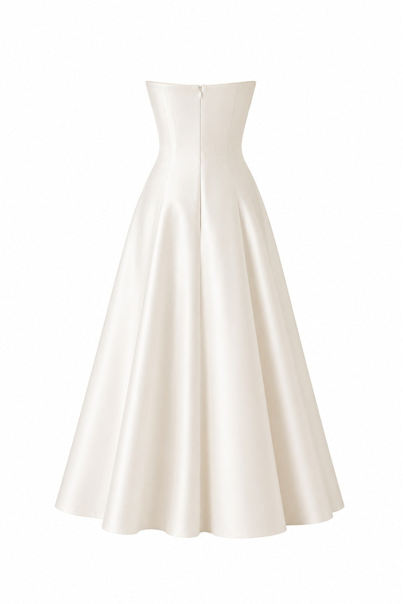 Nihan Peker vanilla ribbon dress gown with elegant satin ribbon details and flowing fabric, perfect for formal occasions.