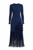 Navy midi dress by Maylé Vásquez featuring a flowing silhouette and elegant design, displayed on a dress form.