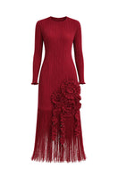 Red CULT MIA X MAYLÉ VÁSQUEZ Rio midi dress displayed on a hanger, showcasing its vibrant color and elegant design.