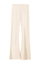 Cream silk-satin bias-cut slim pants by Serenity, shown on a model, featuring a sleek, tailored fit with smooth fabric details.