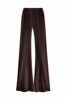 Serenity Riviera Espresso silk-satin bias-cut slim pants displayed on a model, showcasing smooth fabric and tailored fit.
