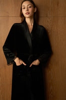 Black velvet lace robe by MANITO, featuring elegant lace trim and a soft, luxurious fabric for a stylish and comfortable look.