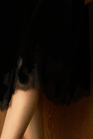 Black velvet lace robe by MANITO, featuring elegant lace details and a soft, luxurious fabric look.