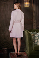 Pink velvet women's robe by MANITO featuring a soft, luxurious fabric and a comfortable, elegant design.