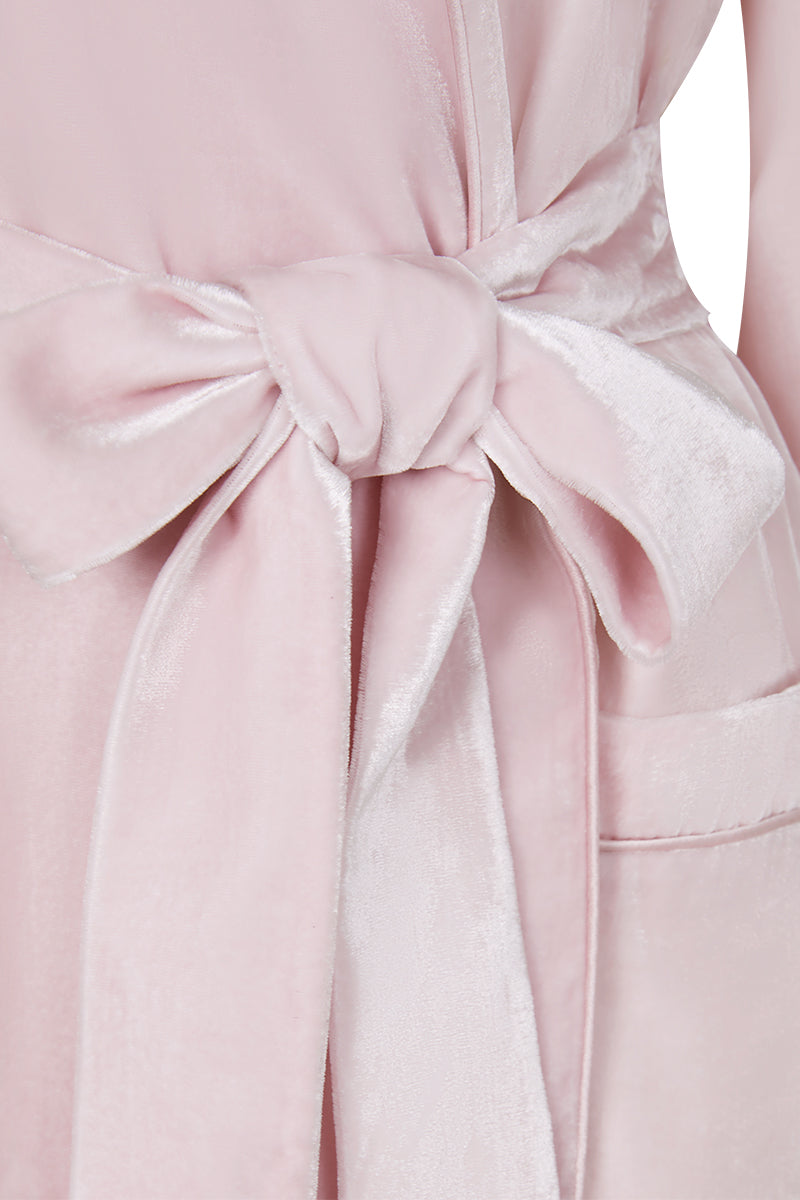 Pink velvet women's robe by Manito, featuring a soft, luxurious fabric and a comfortable, elegant fit.