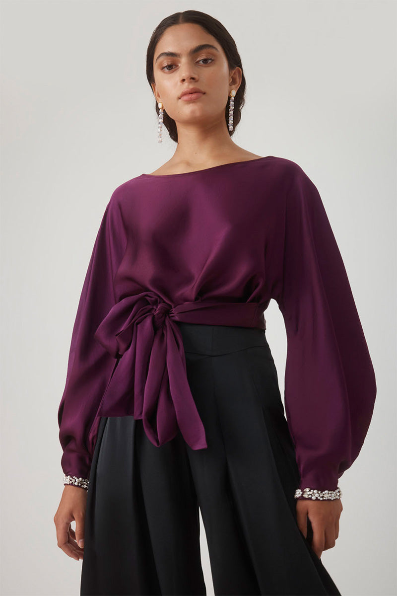 Beaded cuff top in aubergine from MASTANI, featuring intricate bead detailing and a stylish fit, shown on a model.