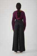 Beaded cuff top in aubergine by Mastani, featuring intricate beaded details and a stylish sleeveless design.