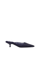 A pair of AERA Rosa Navy metal stud heels featuring navy blue straps and metallic stud embellishments.