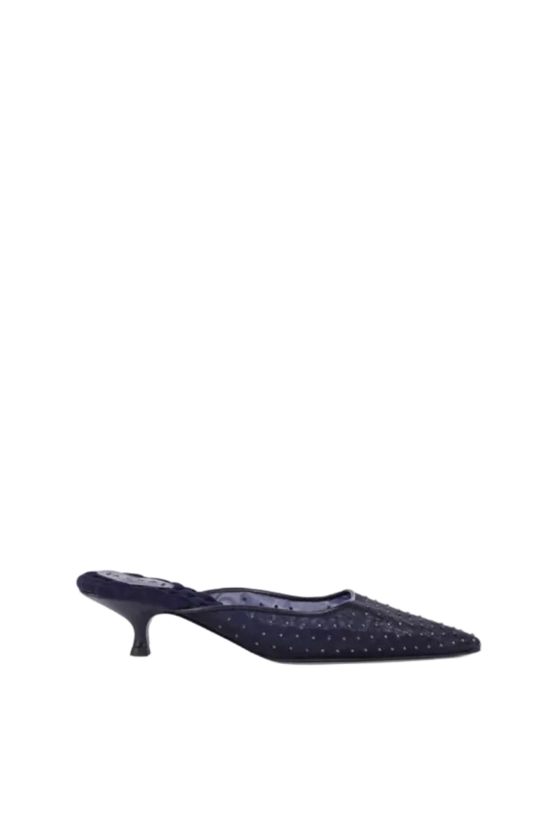 A pair of AERA Rosa Navy metal stud heels featuring navy blue straps and metallic stud embellishments.