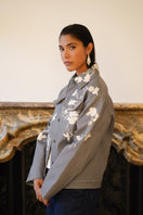 Nadya Shah Rosalind Gray Denim Jacket showing side view with classic collar and button-front design, casual and stylish outerwear.
