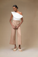 ANA + MARIA Rosave ivory crop top, stylish women's tops with a fitted design, shown in a close-up fashion photo.